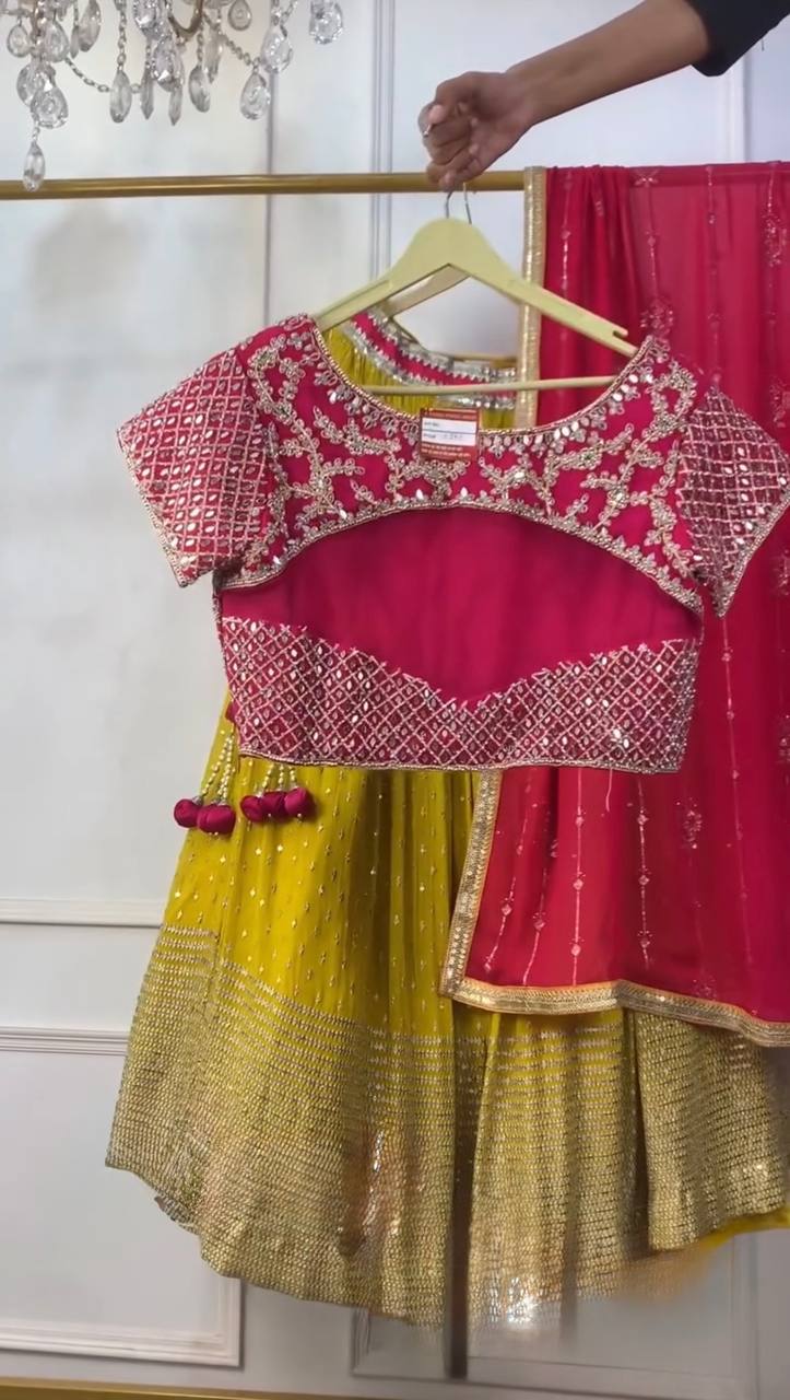 Vibrant Sunshine Yellow and Fuchsia Pink Designer Lehenga Choli with Dazzling Shimmer Embellishments